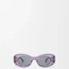 Abgeschrägte ovale Maxi-Anagram-Sonnenbrille Abgeschrägte ovale Maxi-Anagram-Sonnenbrille