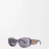 Abgeschrägte ovale Maxi-Anagram-Sonnenbrille Abgeschrägte ovale Maxi-Anagram-Sonnenbrille