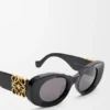 Abgeschrägte ovale Maxi-Anagram-Sonnenbrille Abgeschrägte ovale Maxi-Anagram-Sonnenbrille