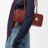Amazona 31 Cropped-Tasche aus glänzendem Kalbsleder Amazona 31 Cropped-Tasche aus glänzendem Kalbsleder