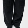 Anagram Baggy-Jeans aus Denim