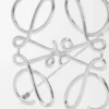 Anagram-Brosche aus Metall Anagram-Brosche aus Metall