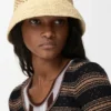 Anagram-Bucket-Hat aus Raffia und Kalbsleder Anagram-Bucket-Hat aus Raffia und Kalbsleder