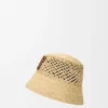 Anagram-Bucket-Hat aus Raffia und Kalbsleder Anagram-Bucket-Hat aus Raffia und Kalbsleder