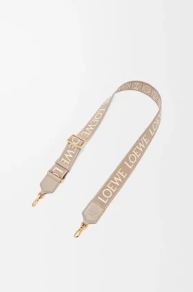 Anagram-Trageriemen aus Jacquard und Kalbsleder