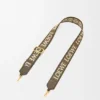Anagram-Trageriemen aus Jacquard und Kalbsleder Anagram-Trageriemen aus Jacquard und Kalbsleder