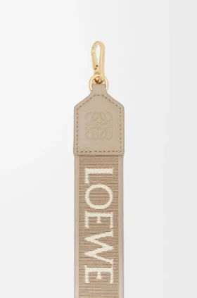 Anagram-Trageriemen aus Jacquard und Kalbsleder
