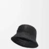 Bucket-Hut aus Raffia und Kalbsleder Bucket-Hut aus Raffia und Kalbsleder