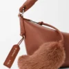 Cala Mini-Tasche aus weichem Nappa-Lammleder Cala Mini-Tasche aus weichem Nappa-Lammleder