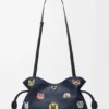 „Cats“ Flamenco-Clutch in mittlerer Größe aus besticktem Denim