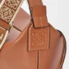 Cubi-Umhängetasche aus geschmeidigem, glattem Kalbsleder und Jacquard Cubi-Umhängetasche aus geschmeidigem, glattem Kalbsleder und Jacquard
