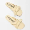 Flamenco-Knoten-Pantolette aus Lammleder Flamenco-Knoten-Pantolette aus Lammleder