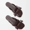 Flamenco-Knoten-Pantolette aus Lammleder Flamenco-Knoten-Pantolette aus Lammleder