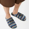 Flex-Pantolette aus Raffia und Kalbsleder Flex-Pantolette aus Raffia und Kalbsleder