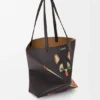 „Futurist Cat“ Puzzle Fold Tote in mittlerer Größe aus Nappa-Kalbsleder „Futurist Cat“ Puzzle Fold Tote in mittlerer Größe aus Nappa-Kalbsleder