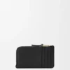 Geldbörse aus glattem und genarbtem Kalbsleder Geldbörse aus glattem und genarbtem Kalbsleder