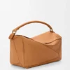 Große Puzzle-Tasche aus geschmeidigem genarbtem Kalbsleder Große Puzzle-Tasche aus geschmeidigem genarbtem Kalbsleder