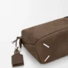 Kleine „Featherlight Puzzle“-Tasche aus genarbtem Nubukleder Kleine „Featherlight Puzzle“-Tasche aus genarbtem Nubukleder