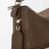 Kleine „Featherlight Puzzle“-Tasche aus genarbtem Nubukleder Kleine „Featherlight Puzzle“-Tasche aus genarbtem Nubukleder