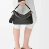 Kleine „Featherlight Puzzle“-Tasche aus Nappa-Lammleder Kleine „Featherlight Puzzle“-Tasche aus Nappa-Lammleder