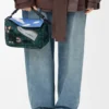 Kleine „Futurist Cat“-Puzzle-Tasche aus besticktem Strick und klassischem Kalbsleder