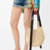 Kleine Hobo-Tasche mit Lochmuster aus Raffia und Kalbsleder Kleine Hobo-Tasche mit Lochmuster aus Raffia und Kalbsleder