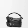 Kleine „Puzzle Biker“-Tasche aus glänzendem Kalbsleder Kleine „Puzzle Biker“-Tasche aus glänzendem Kalbsleder