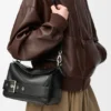 Kleine „Puzzle Biker“-Tasche aus glänzendem Kalbsleder Kleine „Puzzle Biker“-Tasche aus glänzendem Kalbsleder