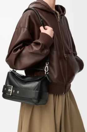 Kleine „Puzzle Biker“-Tasche aus glänzendem Kalbsleder
