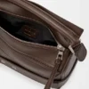 Kleine „Puzzle Biker“-Tasche aus glänzendem Kalbsleder Kleine „Puzzle Biker“-Tasche aus glänzendem Kalbsleder