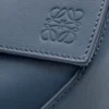 Kleine Puzzle Edge-Gürteltasche aus klassischem Kalbsleder Kleine Puzzle Edge-Gürteltasche aus klassischem Kalbsleder