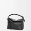Kleine „Puzzle Edge“-Tasche aus klassischem Kalbsleder Kleine „Puzzle Edge“-Tasche aus klassischem Kalbsleder