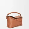 Kleine „Puzzle Edge“-Tasche aus klassischem Kalbsleder Kleine „Puzzle Edge“-Tasche aus klassischem Kalbsleder