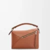 Kleine „Puzzle Edge“-Tasche aus klassischem Kalbsleder Kleine „Puzzle Edge“-Tasche aus klassischem Kalbsleder