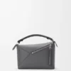 Kleine „Puzzle Edge“-Tasche aus klassischem Kalbsleder Kleine „Puzzle Edge“-Tasche aus klassischem Kalbsleder