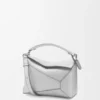 Kleine „Puzzle Edge“-Tasche aus laminiertem Lammleder Kleine „Puzzle Edge“-Tasche aus laminiertem Lammleder