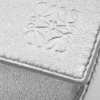 Kleine „Puzzle Edge“-Tasche aus laminiertem Lammleder Kleine „Puzzle Edge“-Tasche aus laminiertem Lammleder