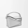 Kleine „Puzzle Edge“-Tasche aus laminiertem Lammleder Kleine „Puzzle Edge“-Tasche aus laminiertem Lammleder