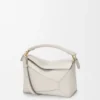 Kleine Puzzle Edge-Tasche aus weichem, genarbtem Kalbsleder Kleine Puzzle Edge-Tasche aus weichem, genarbtem Kalbsleder