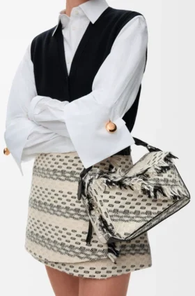 Kleine „Puzzle“-Tasche aus gewebtem Textil Kleine „Puzzle“-Tasche aus gewebtem Textil