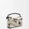 Kleine „Puzzle“-Tasche aus gewebtem Textil Kleine „Puzzle“-Tasche aus gewebtem Textil