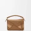 Kleine „Puzzle“-Tasche aus klassischem Kalbsleder und Wildleder Kleine „Puzzle“-Tasche aus klassischem Kalbsleder und Wildleder