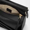Kleine „Puzzle“-Tasche aus klassischem Kalbsleder und Wildleder Kleine „Puzzle“-Tasche aus klassischem Kalbsleder und Wildleder