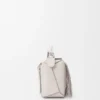 Kleine Puzzle-Tasche mit Fransen aus klassischem Kalbsleder Kleine Puzzle-Tasche mit Fransen aus klassischem Kalbsleder