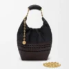 Kleine Squeeze-Tasche aus gewebtem Nappa-Kalbsleder Kleine Squeeze-Tasche aus gewebtem Nappa-Kalbsleder