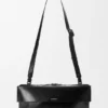 Kleine Switch-Tasche aus Paper-Kalbsleder und Wildleder