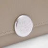 Kleines, vertikales Portemonnaie „Pebble“ aus genarbtem Kalbsleder Kleines, vertikales Portemonnaie „Pebble“ aus genarbtem Kalbsleder