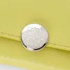 Kleines vertikales Portemonnaie „Pebble“ aus glänzendem Nappa-Kalbsleder Kleines vertikales Portemonnaie „Pebble“ aus glänzendem Nappa-Kalbsleder