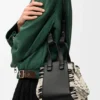 Kompakte „Hammock“-Tasche aus gewebtem Textil