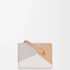 Kompaktes Puzzle-Portemonnaie aus klassischem Kalbsleder Kompaktes Puzzle-Portemonnaie aus klassischem Kalbsleder